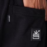 Sweet pant French terry Negro logo en Goma 14375