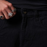 JEANS BAGGY CORTE DIAGONAL NEGRO