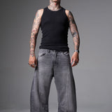 JEANS BAGGY CORTE DIAGONAL OSCURO