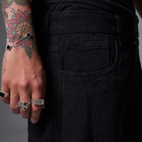 JEANS BAGGY CORTE DIAGONAL NEGRO